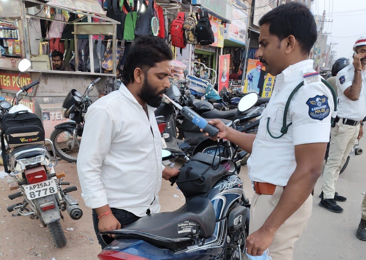 Police traffic checkpoint with breath analyzer