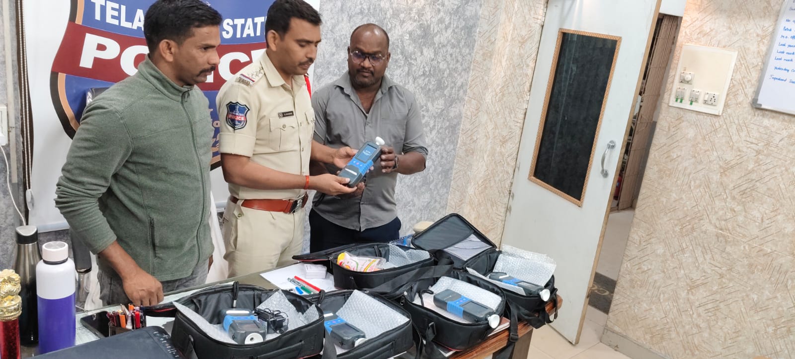 Breath analyzer units being delivered and inspected